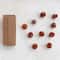 Hello Honey® 6ft. Orange Paper Folding Honeycomb Pumpkin Garland
